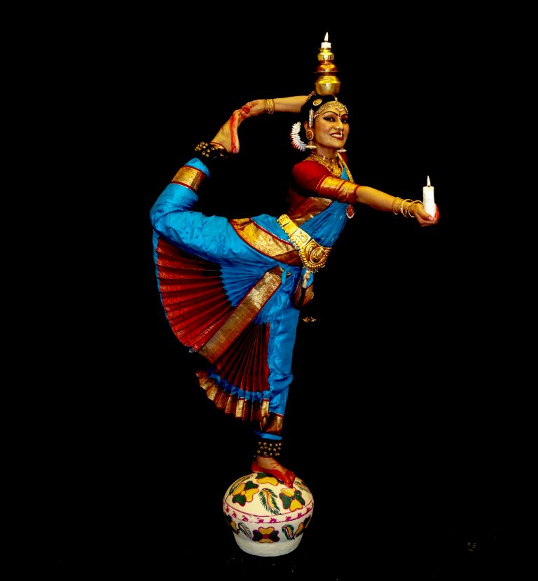 An image representing a classical dancer dancing on s pot